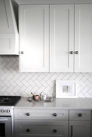 Tile layout and laying the first herringbone. Subway Tile Designs Inspiration A Beautiful Mess