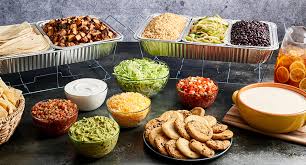 A taco bar is an easy way to entertain a large crowd and i'm going to show you 6 easy tips to create your own fiesta themed graduation party everyone elements of the taco bar: Mexican Party Platters Trays Event Party Catering