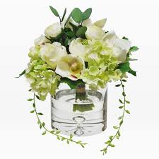 Leaves rot when kept in water and can damage the entire arrangement. Faux Flower Bouquet In Vase White
