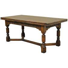 While most may think that all jacobean furniture designs are very similar, it is worth mentioning that there were three distinct furniture styles that fall under the umbrella of the jacobean period, occasionally referred to as the stuart period. 1930s Solid Carved Oak Jacobean Style Refectory Extension Plank Dining Table At 1stdibs