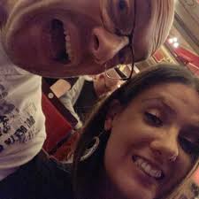 Bit of a long shot, but did anyone happen to be getting off of a bus or  getting