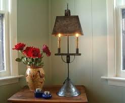 The american colonial interior design is based on the woodwork and trim used widely throughout the house and gives a sense of backing in time. Authentic Handcrafted Early American Colonial Tinsmith Alexandria Table Lamp