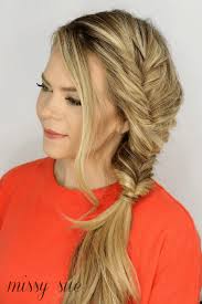 Pull the hair from right side and start braiding two french braids till it reaches left ear. Faux Fishtail Braid