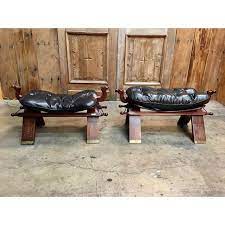 Vintage middle eastern wood & leather camel saddle w/ copper adorrnments. Vintage Mid Century Rosewood And Leather Camel Saddle Stools A Pair Chairish