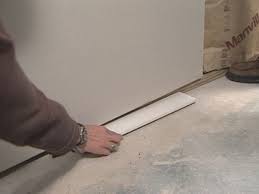 Drywall Should Definitely Not Touch Concrete As Moisture Will Wick Ie Flow Up The Surface As Drywall Installation Basement Remodel Diy Cheap Basement Remodel