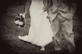 The options for wedding dress rentals can be limited compared with buying new. Wedding Photo Of Bride In White Wedding Dress Groom In Taupe Morning Suit Hand In Hand