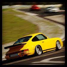 Ruf Ctr 029 In Yellowbird Yellow Driving Through The Karussell At The Nurburgring The Last Car Of The Original Run Vintage Porsche Classic Porsche Porsche 911