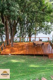 Ao Lado Do Rio E Interagindo Com A Natureza Voce Tem Um Deck Para Reunir A Familia E Os Amigos Decks De Madeira Decks Jardim Decks