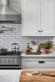 The possibilities are endless with these 6 x 6 black and white mosaic peel and stick removable tile stickers. Long White Kitchen Backsplash Tiles With Black Grout Transitional Kitchen