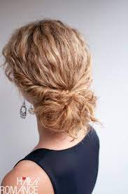 If your hair is too short to pull into one bun, create 4 small knots instead. Curly Hairstyle Tutorial The Twist Tuck Bun Hair Romance