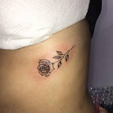 50 Simple Tiny Small Rose Tattoo Ideas For Women Small Rose Tattoo Rose Tattoos For Women Rose Rib Tattoos