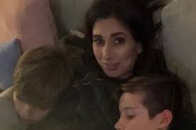 Stacey Solomon shows off bare baby bump as she cuddles up to sons in sweet  photo shared by boyfriend Joe Swash