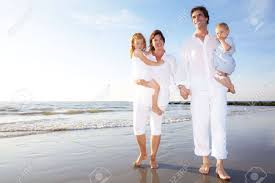 Choose from hundreds of free family pictures. Young Happy Family Dressed In White And Walking On The Beach Stock Photo Picture And Royalty Free Image Image 5407219