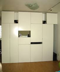 With just a few sample pots, some white paint tape, this plain pine unit can add a splash a color to any child's room. Faktum Minimalist Ikea Hackers Ikea Wall Cabinets Bedroom Wall Cabinets Office Wall Cabinets