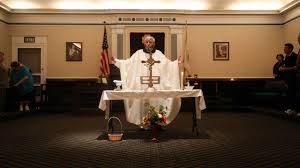 Catholic parishioners who spent 11 years occupying a closed church find a  new home — inside a temple