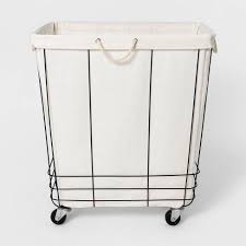 Available in six colors, the land of nod's canvas hampers feature a rolled top, as well as sturdy sides. Industrial Rolling Laundry Basket Threshold Target