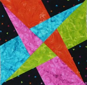 "Crazy Amish” is a Free Amish Quilt Block Pattern designed by Marcia from Quilters Cache!