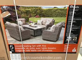 For just under $200 a side table with a fire pit is a total steal! Agio 5 Piece Woven Deep Seating Set With Fire Table Costco Weekender