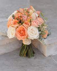 Your bouquet should be in harmony with all that, its wrap, look and texture should correspond. Peach Floral Centre Pieces Google Search Peach Wedding Flowers Bridal Bouquet Peach Peach Wedding