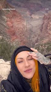 Name: Lena Scissorhands , Role: Vocalist & Composer , Band: Infected Rain ,  Country: Moldova