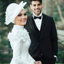 صورعرايس زفاف خلفيات عرايس رمزيات عرايس اجمل الصور للعرائس المحجبات اجمل الصور عرايس محجبات جديدة in 2021 wedding dresses wedding sneaker wedding shoe
