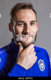 Serbian football player Nemanja Gudelj of China's Guangzhou Evergrande  Taobao FC shoots to score a goal against South Korea's Jeju United in a  Group G Stock Photo