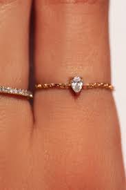 Redline Jewerly Altesse Ring With 0 10ct Pear Diamond In Rose Gold Prong Setting Redline