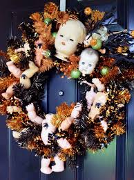 Diy Network Loves These Witty And Outrageous Halloween Wreaths Diy Halloween Wreath Halloween Doll Halloween Tree Decorations