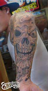 Betty boop in a circle on lower back; Steve From S F Skull Sleeve Skull Sleeve Tattoos Sleeve Tattoos
