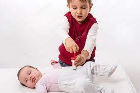 Brother And Sister Playing Doctor And Patient Stock Photo Image By C Nonmim 101303708