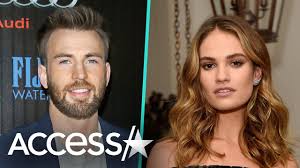 When i heard lily james was dating chris evans, my first thought was jesus, save some first names for the rest of us, guys. then i saw chris evan's monster hog and figured she would marry him,. Chris Evans Lily James Step Out In London Youtube