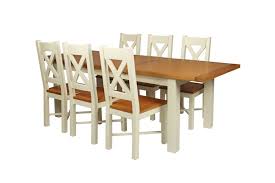 It's crafted with a distressed top and eased edges, and designed to maximize legroom and serving space. Country Oak 230cm Cream Painted Extending Dining Table 6 Grasmere Cream Painted Chairs