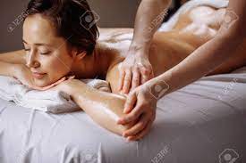 Spa Body Massage Treatment. Woman Having Massage In The Spa Salon Stock  Photo, Picture and Royalty Free Image. Image 93923341.
