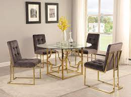 This dining chair offers a chic modern update to your dining room décor. Orchid Gold Finish Dining Table Set