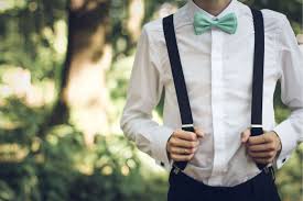 A man wearing suspenders with button fastenings, 2006. 4 Tips On Wearing Suspenders With Your Suit Jim S Formal Wear Blog