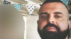 Gold Coast thug attacks woman after she found him in her car