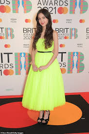 Global icon taylor swift lives it up with haim as the american acts enjoy a boozy night in after triumph at the brit awards. Brit Awards 2021 Performer Olivia Rodrigo Wears Fluorescent Yellow Dior Dress On Red Carpet Daily Mail Online