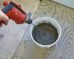 Mixing Thinset Mortar With Heavy Duty Drill And Paddle Type Mixing Tool Backerboard Installation Tile Floor