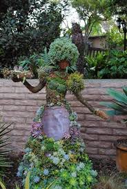 Succulent Garden Girl Gardens Click Diy Garden Projects Garden Whimsy Garden Projects
