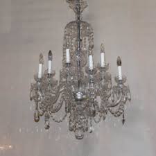 This item has eight profiled glass arms with cut crystal octagons and pear drop shaped lead crystals in small and large sizes throughout this beautiful chandelier. Two Tier Czech Crystal Chandelier The Big Chandelier