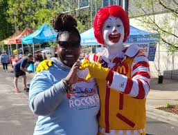  A volunteer and Ronald McDonald