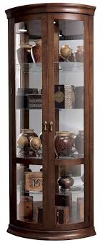 Chancellor Half Round Corner Curio Cabinet In Cherry By Howard Miller Home Gallery Stores Corner Display Cabinet Glass Curio Cabinets Curio Cabinet Decor