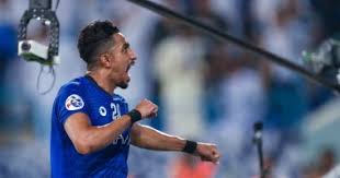 وقال في موضع آخر : Ø§Ù„Ø¯ÙˆØ³Ø±Ù‰ Ù†Ø¬Ù… Ø§Ù„Ù‡Ù„Ø§Ù„ ÙŠØ¹ÙˆØ¯ Ù„Ù„ØªØ³Ø¬ÙŠÙ„ Ø¨Ø¯ÙˆØ±Ù‰ Ø£Ø¨Ø·Ø§Ù„ Ø¢Ø³ÙŠØ§ Ø¨Ø¹Ø¯ ØºÙŠØ§Ø¨ Ø¹Ø§Ù…ÙŠÙ† ÙÙŠØ¯ÙŠÙˆ Ø§Ù„ÙŠÙˆÙ… Ø§Ù„Ø³Ø§Ø¨Ø¹