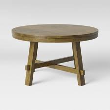 Petrified wood has turned into stone. Edonton Round Wood Farmhouse Coffee Table Brown Threshold Target