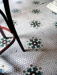 Black And White Mosaic Tile Kitchen Floor Antique Hex Tile Floor With Snowflake Pattern At Dollop Coffee Co In Chicago Kitchen Flooring Hex Tile Kitchen Floor Tile