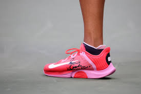 While many are awaiting the release of naomi osaka's nike blazer, the brand has dropped the tennis star and activist's new apparel collection. Naomi Osaka S 2020 Us Open Nike Sneakers Send A Message Popsugar Fitness