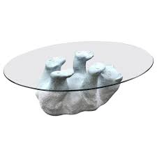 It lets you create a warm and inviting look with your favorite decor, collectibles. Mid Century Modern Polar Bear Cub Cocktail Coffee Table Oval Glass Top At 1stdibs
