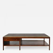 Two drawers with brass pulls. Paul Mccobb Paul Mccobb Leather Top Coffee Table Calvin Group
