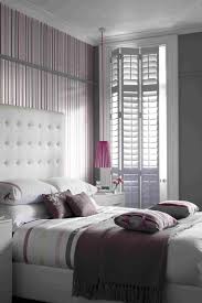 The slats are louvered to allow in light, and the shutter doors are hinged to provide easy access to the window. Patio French Door Shutters Diy Shutters