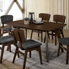When choosing a modern dining table, consider how you use your space. Carson Carrington Breisgau Walnut Mid Century Dining Table Overstock 23570091